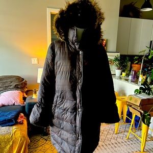 Full length puffer jacket with a large hood. Only word twice!